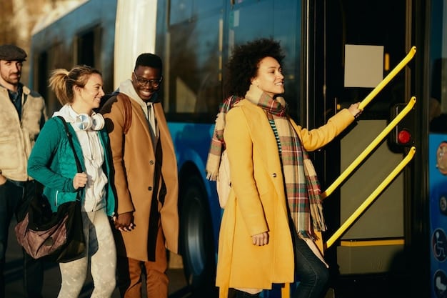 A diverse group of people is waiting at a modern and clean bus stop in a US city. An electric bus is pulling up to the stop, and several people are preparing to board. The scene emphasizes the accessibility and eco-friendliness of public transportation.