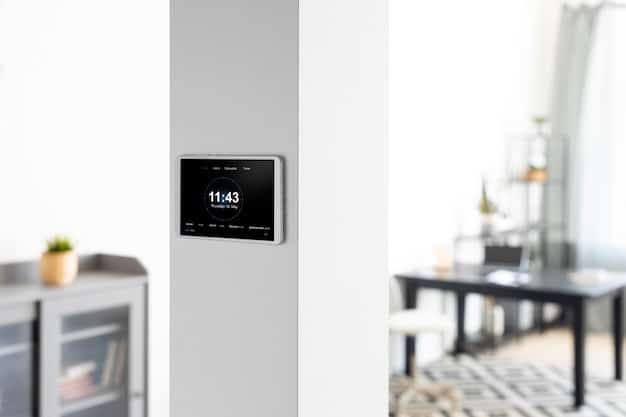 A close-up of a smart thermostat installed in a modern living room, showcasing energy efficiency and home automation.
