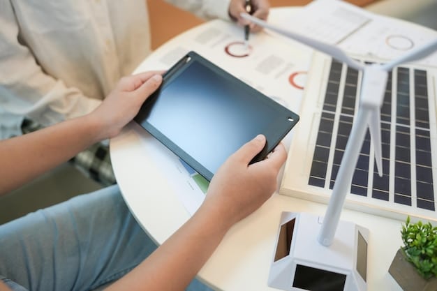 A close-up shot of a smart meter displaying real-time energy consumption data, with a tablet showing a solar panel system performance dashboard in the background.