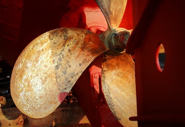 A close-up shot of a wind turbine blade being shredded in a recycling facility, showing the separation of fiberglass and resin materials. Visible safety measures and machinery.