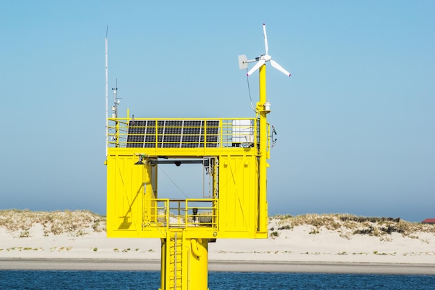 A graph comparing the levelized cost of energy (LCOE) for offshore wind, onshore wind, solar, and natural gas power plants over the past decade, showing trends and projections for the future. Highlight points where offshore wind LCOE becomes competitive with other sources.