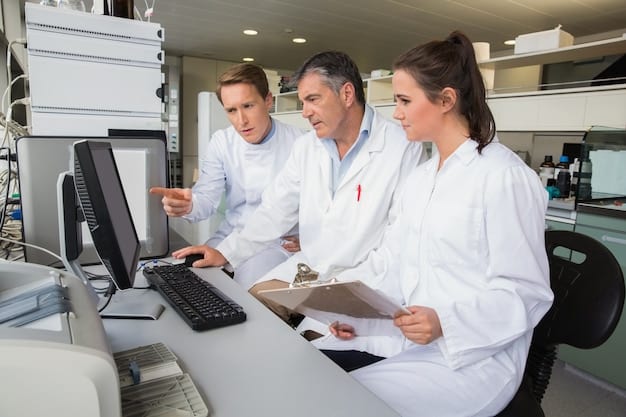 A group of scientists and engineers working together in a modern laboratory, surrounded by advanced equipment and computer displays showing reactor simulations. The scene depicts collaboration and innovation in nuclear research.