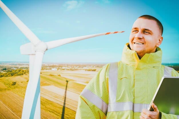 A close-up of a technician working on a wind turbine generator, with rolling green hills and a blue sky in the background.