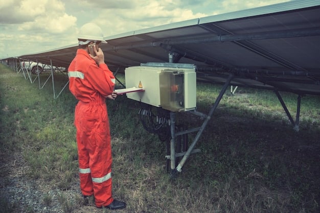 A person in protective gear inspecting a solar panel installation in a field, with wind turbines visible in the background. The focus is on the maintenance and monitoring aspect of clean energy projects, emphasizing environmental stewardship.