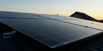 High-efficiency solar panels on a US home rooftop at dawn, showcasing advanced renewable energy technology.